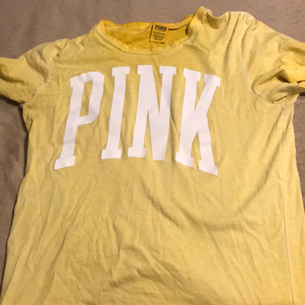 Pink yellow t shirt runs bigs